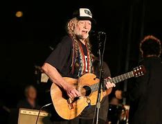 Image result for Willie Nelson Winning an Grammy