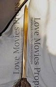 Image result for Real Peter Pan Gold Coconut Sword