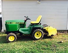 Image result for John Deere 318 Tiller Parts