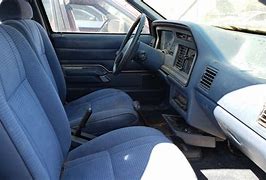 Image result for Ford Tempo Junkyard