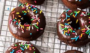 Image result for Sprinkled Donuts