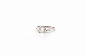 Image result for Pear and Emerald Cut Diamond Ring