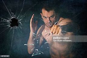 Image result for Fist Breaking Glass