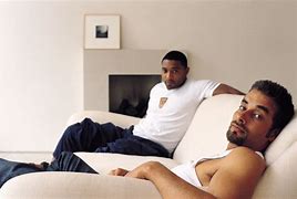 Image result for Man Lounging On Sofa