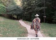 Image result for Man Wearing Poncho