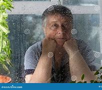 Image result for Sad Behind Glass Window