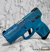 Image result for Taurus 9Mm Teal