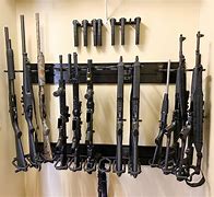 Image result for Wall Mounted Gun Rack Designs