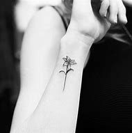 Image result for Lily Flower Tattoos On Wrist