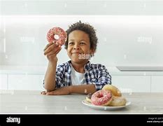 Image result for Kids Eating a Dount