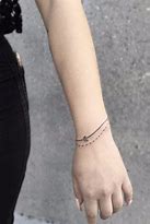 Image result for Name Bracelet Tattoos On Wrist