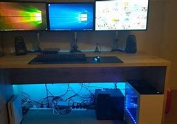 Image result for Organize Cords Under Desk