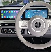 Image result for Comet EV Vehicle