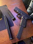 Image result for Glock 9Mm Extended Clip