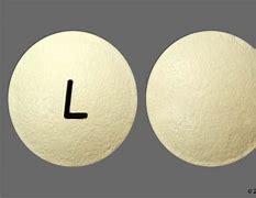 Image result for Round Yellow Pill with L On It