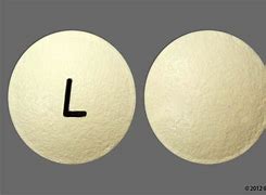 Image result for Round Yellow Pill with L On It