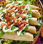 Image result for Mexican Beef Flautas