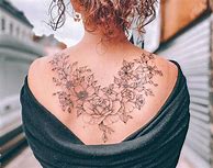 Image result for Feminine Back Tattoo Designs