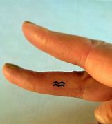 Image result for Aquarius Finger Tattoo