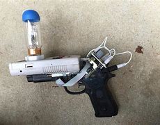 Image result for Rick and Morty Portal Gun