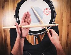 Image result for How to Hold Drumsticks