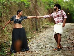 Image result for Varnakazhchakal Movie