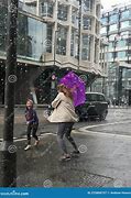 Image result for Mother Protecting Child Rain