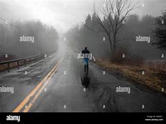 Image result for Man Walking Alone in Rain