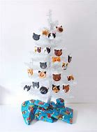 Image result for Cat Inside Christmas Tree