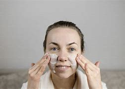 Image result for Woman Applying Face Cream