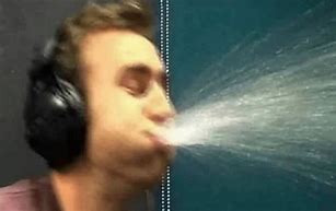 Image result for Man Spitting Drink