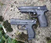 Image result for Ruger SR22 vs Walther P22