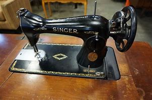 Image result for Singer Treadle Sewing Machine