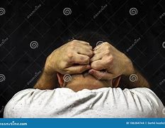 Image result for Man Black Shirt Hands Behind the Back