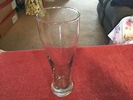 Image result for Tall Beer Glass Tilted