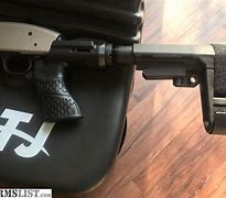 Image result for Mossberg 590 Adjustable Stock