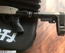 Image result for Mossberg 590 Adjustable Stock