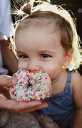 Image result for Kids Eating a Dount