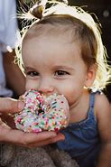 Image result for Kids Eating Donuts