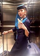 Image result for Oman Air Stewardess