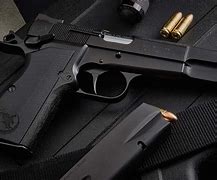 Image result for Browning Hi-Power Tactical