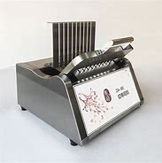 Image result for Sushi Cut Machine