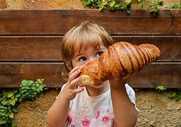 Image result for Kids Eating a Dount