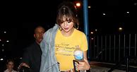 Image result for Selena Gomez Yellow Shirt