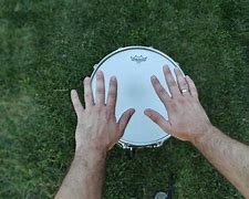 Image result for How to Hold Drumsticks