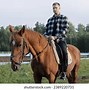 Image result for Guy Riding a Horse