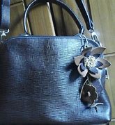 Image result for Tas Kulit Motif