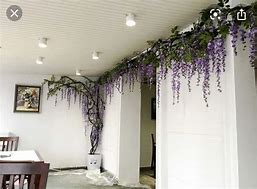 Image result for Statues Covered with Wisteria