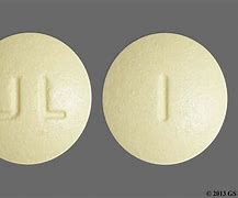 Image result for Round Yellow Pill with L On It