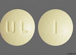 Image result for Round Yellow Pill with L On It